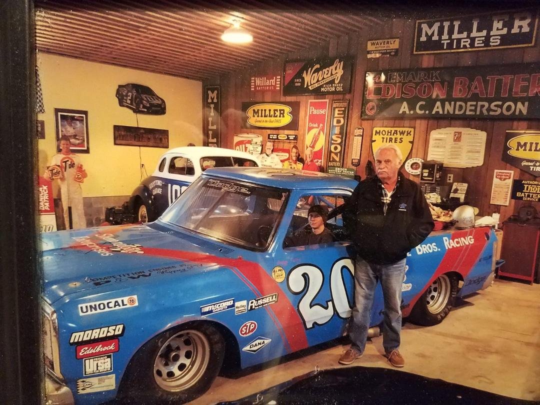 Me and grandson Jake sitting in my old race truck 33 years later.