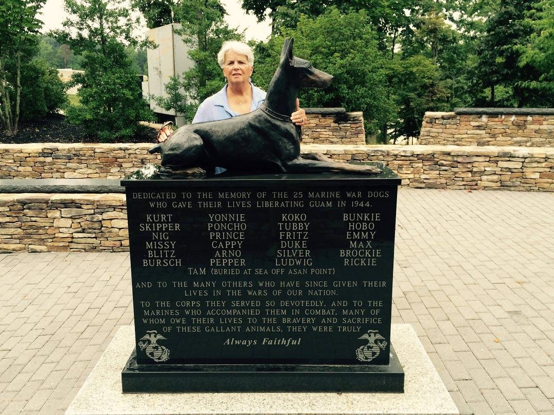 Lyn at the Marine Corps War Dog Monument at the Marine corps Museum.