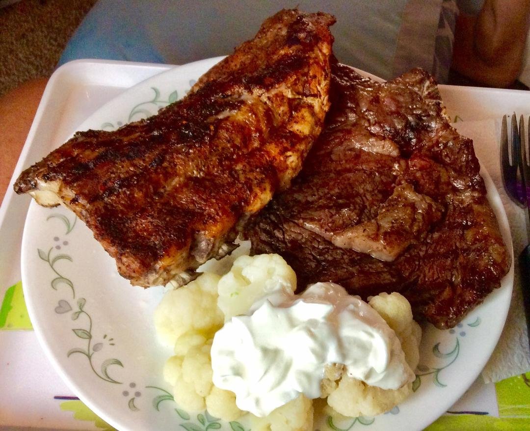 Feast time. Got Bone-in Ribeyes on sale for $5.77 a pound plus a StLouis Rib I got for under $7.    Served with Cauliflower topped with Sour Cream. Feeling very satisfied.   #ribeye #stlouisribs #keto