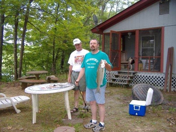 Big fish, we later let it go, so no fish were hurt in the taking of this picture, my hubby, Jimmy(green shirt) and a friend.