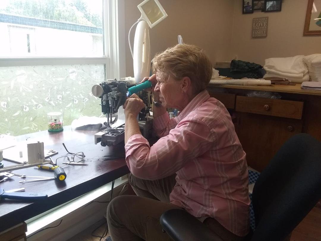 A day at Sandi's stitches lol my friend nadean working on machine. She didn't like the noise!