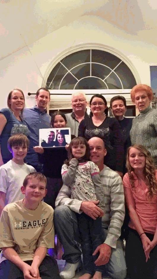 Family photo taken Christmas 2014 with 4 generations of Riggerts, including their spouses and kids. Brian Boro and Rye Boro joined in on the photo via Skype. Also in the picture is Great Grandma Joyce Riggert, Tad Riggert
