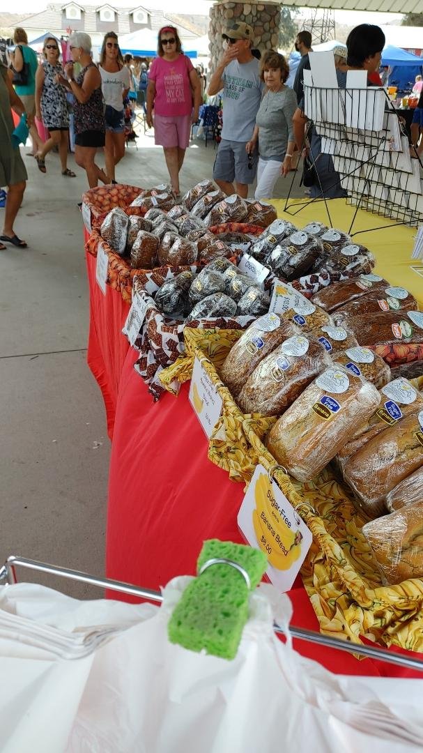 At the farmers market in Bullhead with Dawn Herrell-Sayre. Selling Red's Bread's... Come early the bread is flying off the shelves...