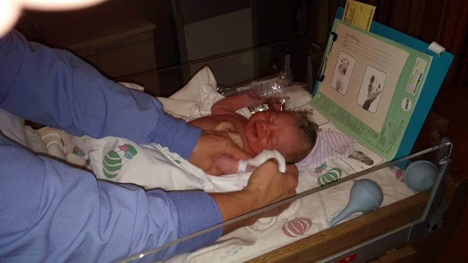 Ok here we go Allyson was born at 7:57 am she is 20 3/4 inches long and weight was 8lbs 9 oz