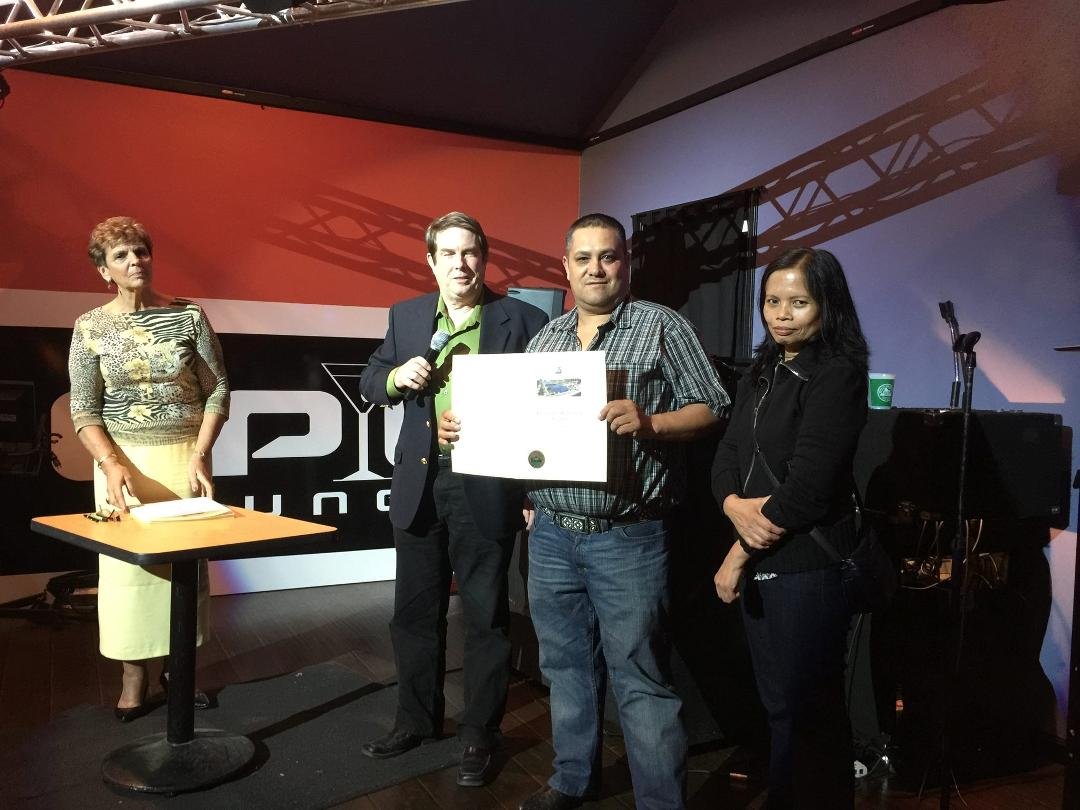 Accepting our Certificate of Recognition from our mayor and the people of Stockton for Outstanding Small Business
