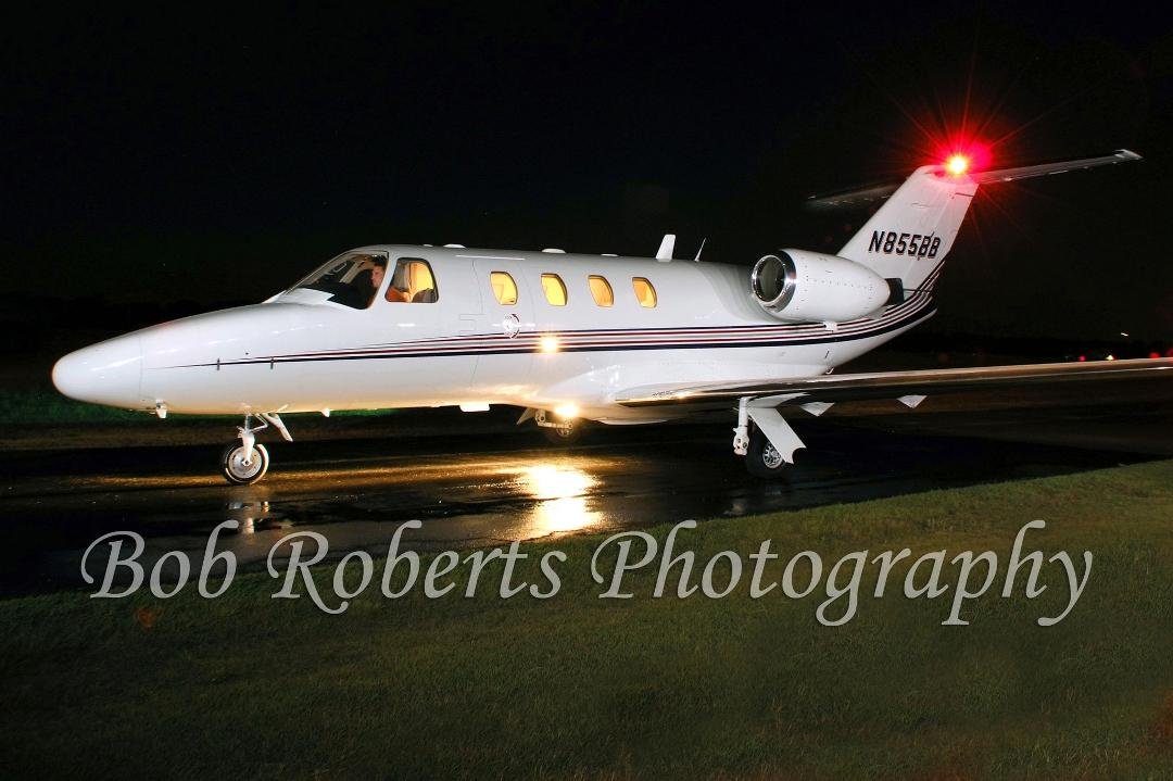 Cessna Citation Jet on Taxiway at night