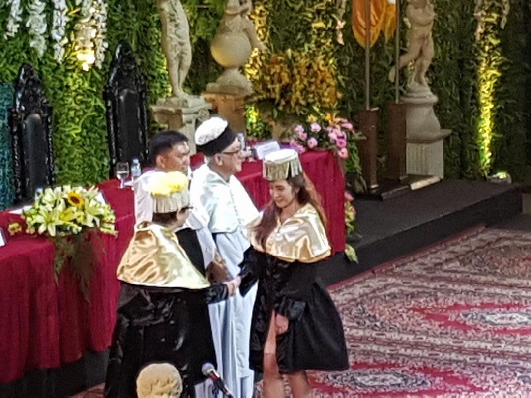 Conferring of MD degree