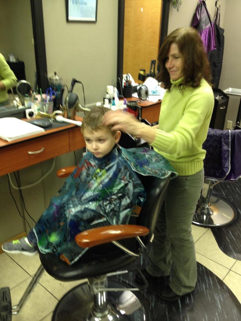 Tony getting haircut