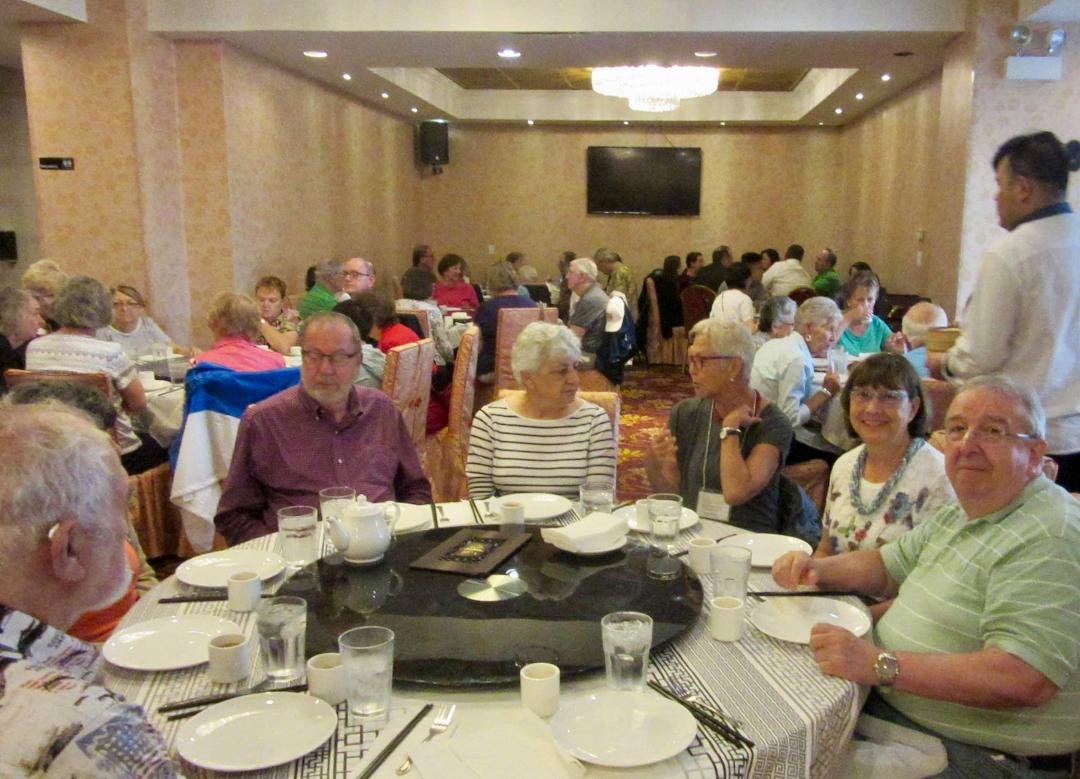 Lunch at the famous Phoenix Restaurant in Chinatown. Lazy Susan on all the tables. Plates of food to pass...till the cows come home. No chicken feet...but everything else Chinese-American. No cats or snakes!