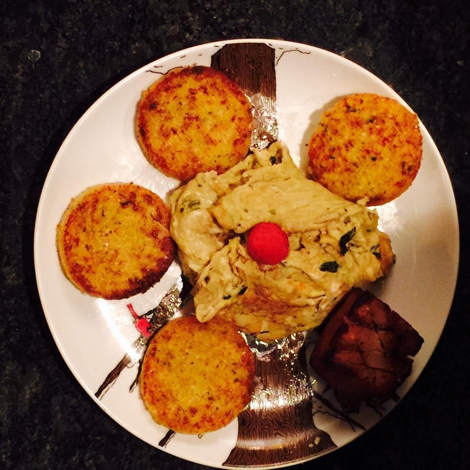 This morning's breakfast: Spinach-Artichoke Scramble with Polenta Rounds and Crispy Pork Belly....oh, and a solitary raspberry for color.