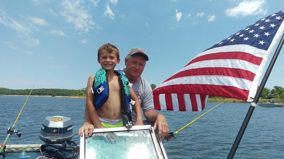 Memorial Day fishing tournament winners Gabe and Papa, Show us the $$