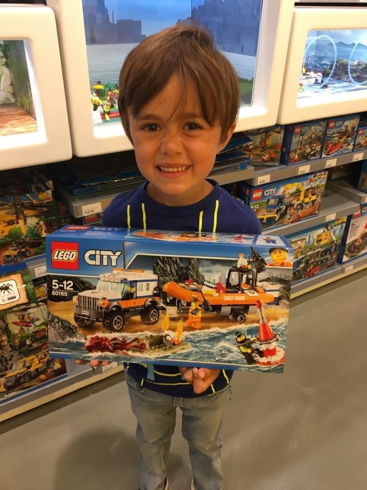 Jamie finally made a selection at the Lego store.