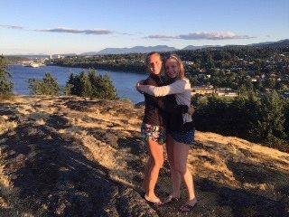 Yesterday, I got a short note and this picture of Marie (on the left) reunited with Kristina (on the right) after 9 months apart. They’re with Tini and Kristina’s jr. year abroad family in Nanimo in B.C. Marie has been tr