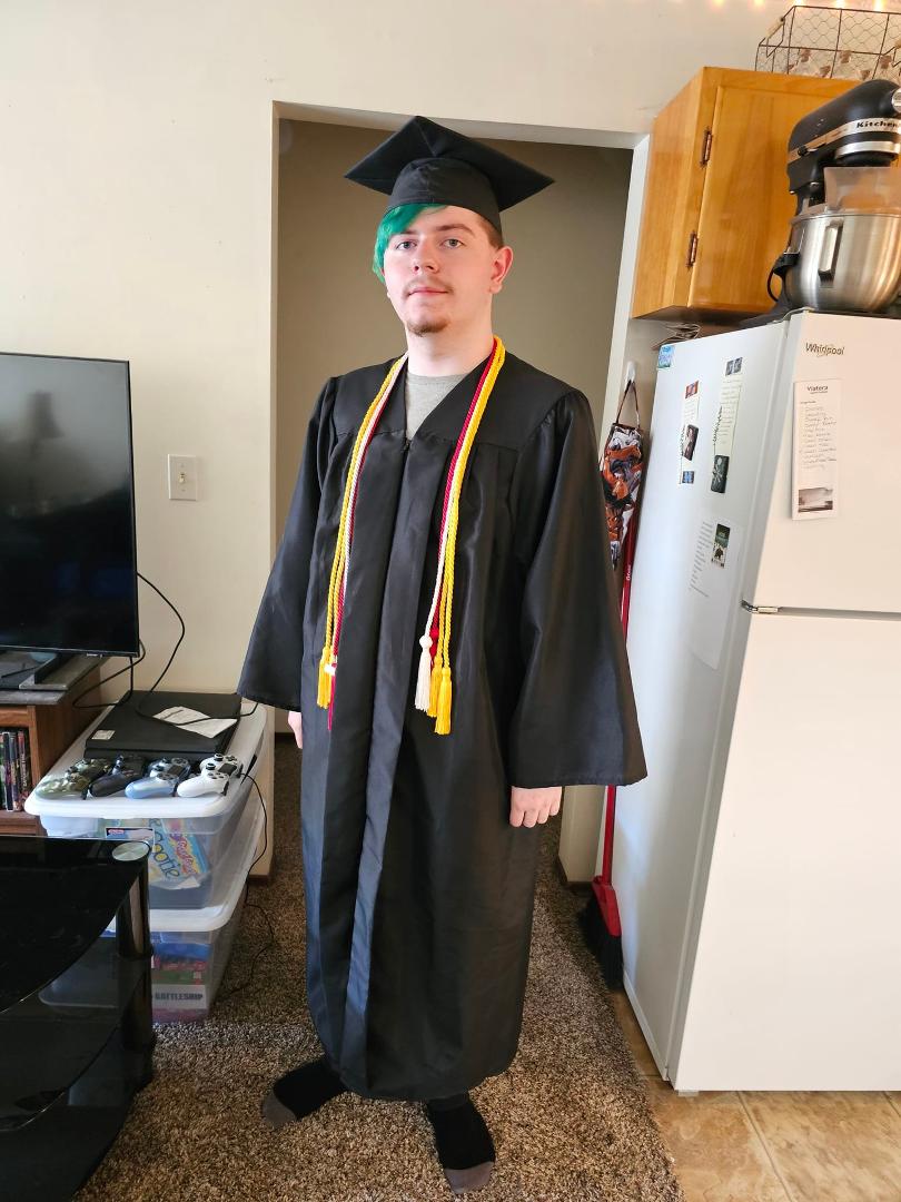 Our grandson Joe, graduating with honors!