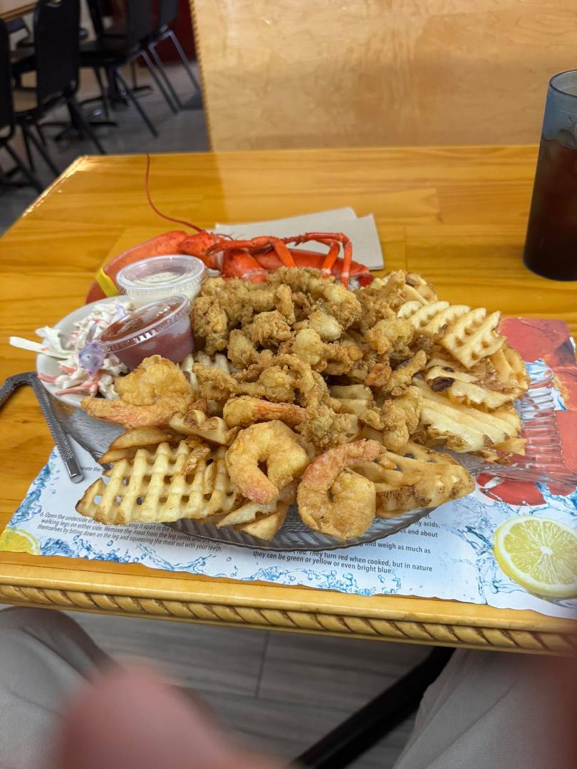 Last meal in Maine. Lobster, whole belly clams, shrimp and cole slaw. Yep, heaven.