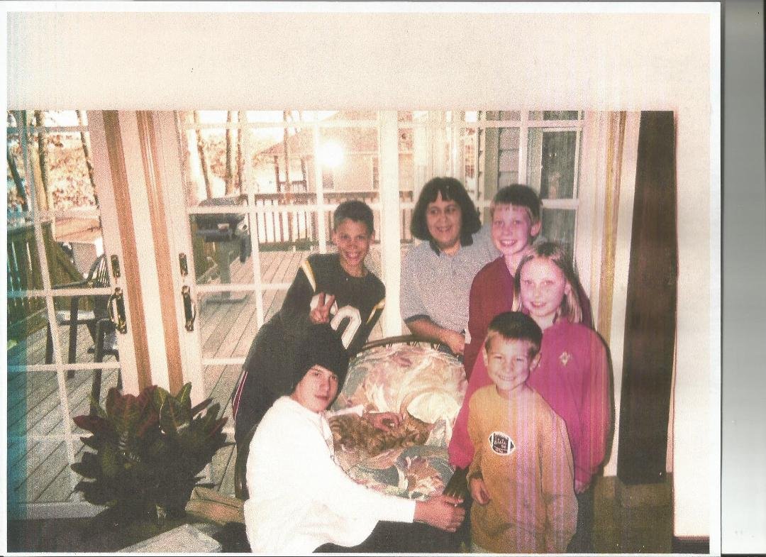 Just a picture of me and my gang, in younger days; about 13 years ago, when we lived at #4; that was before #3, etc.: Four boys, two tomboys and one tom-cat! Those were the days!