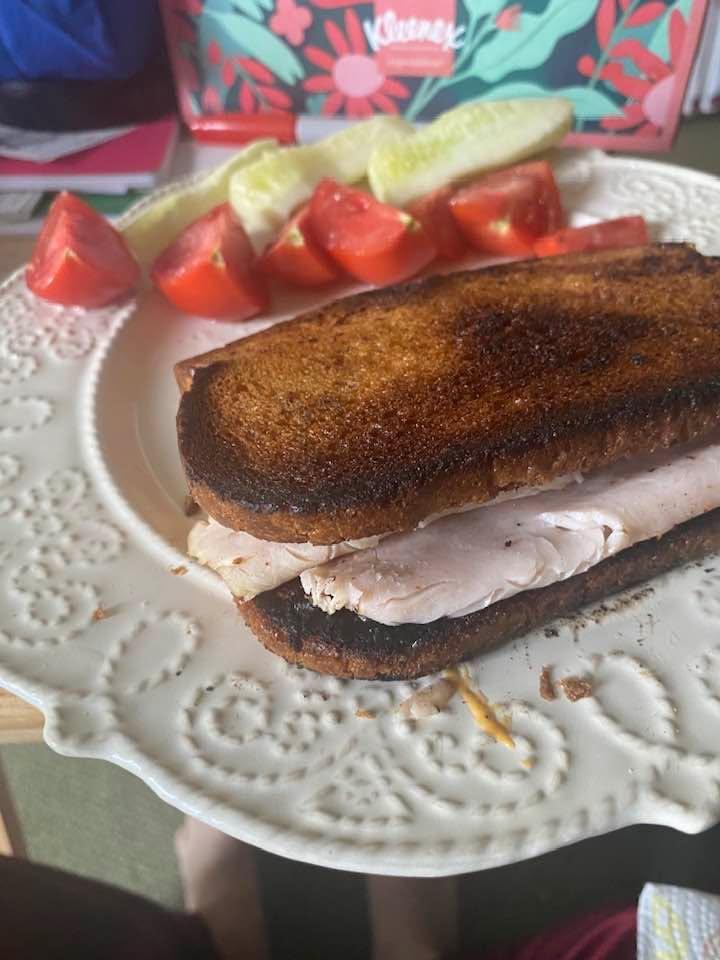 This was my lunch today. Grilled cheese on Rye, along with with a slice of Honey Maple Turkey. A piece of Cucumber and two Campari Tomatoes.
The thing that makes this Grilled Cheese unusual is that this particular Grill