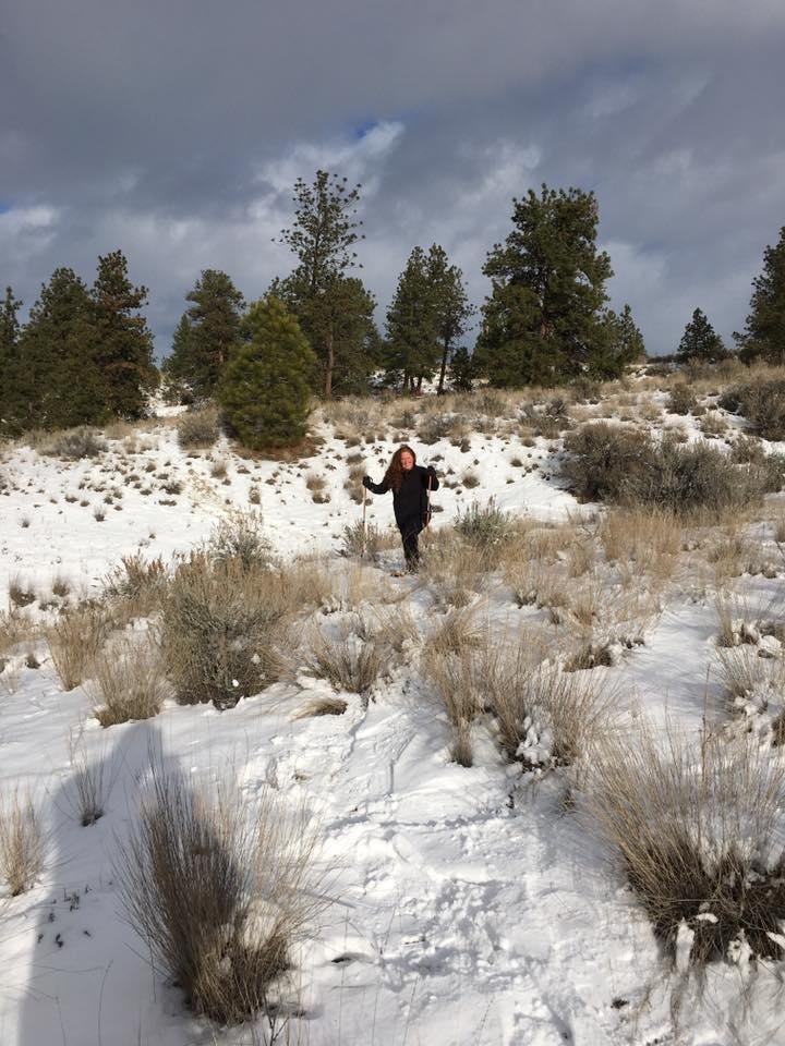 Amy snow shoeing in the wild Montana tundra.