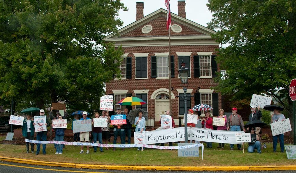 A group of upstanding Americans participating in the National Anti-Keystone XL Pipeline Day- in the rain in Dahlonega, GA. I am to the left in back. My sign refers to Thomas Edison, who saw the wisdom of solar energy- back 