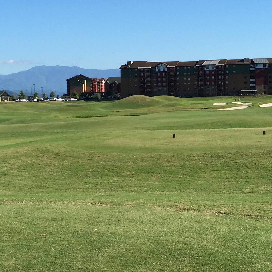 18th hole at Sevierville Golf Club River Course. Mt LeConte in the background. Beautiful day. Fall is here!