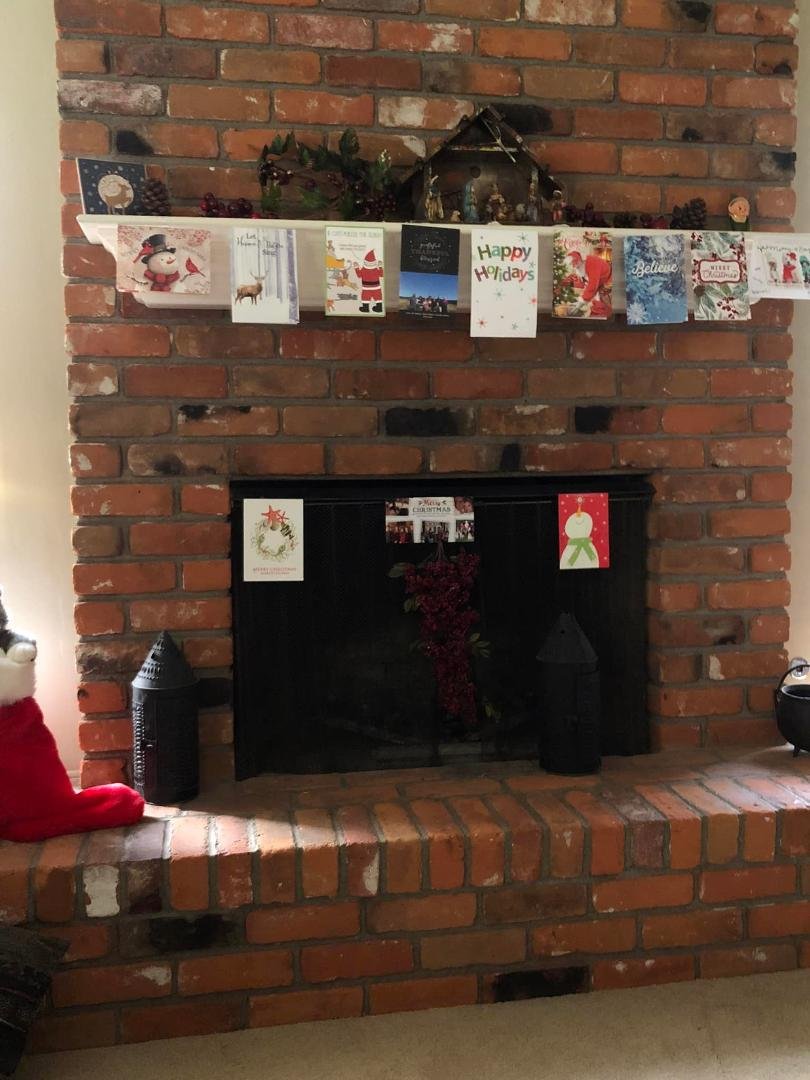 Our fireplace all decked out! It’s hard to see the manger on the mantle, but it’s there!