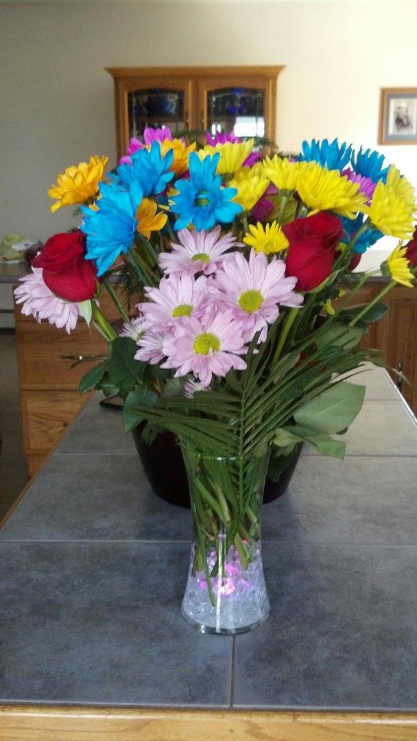 My husband and kids gave me this vase with beautiful flowers in it and some diamond earrings. I am so blessed to have such a wonderful family!!!