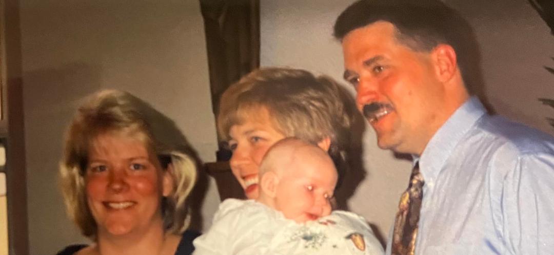 A picture from
1998 I never saw before so I had to post (and can’t wait til
it shows up in my memories)! Being godparents With Michael Cerne who I have known since 1962!
