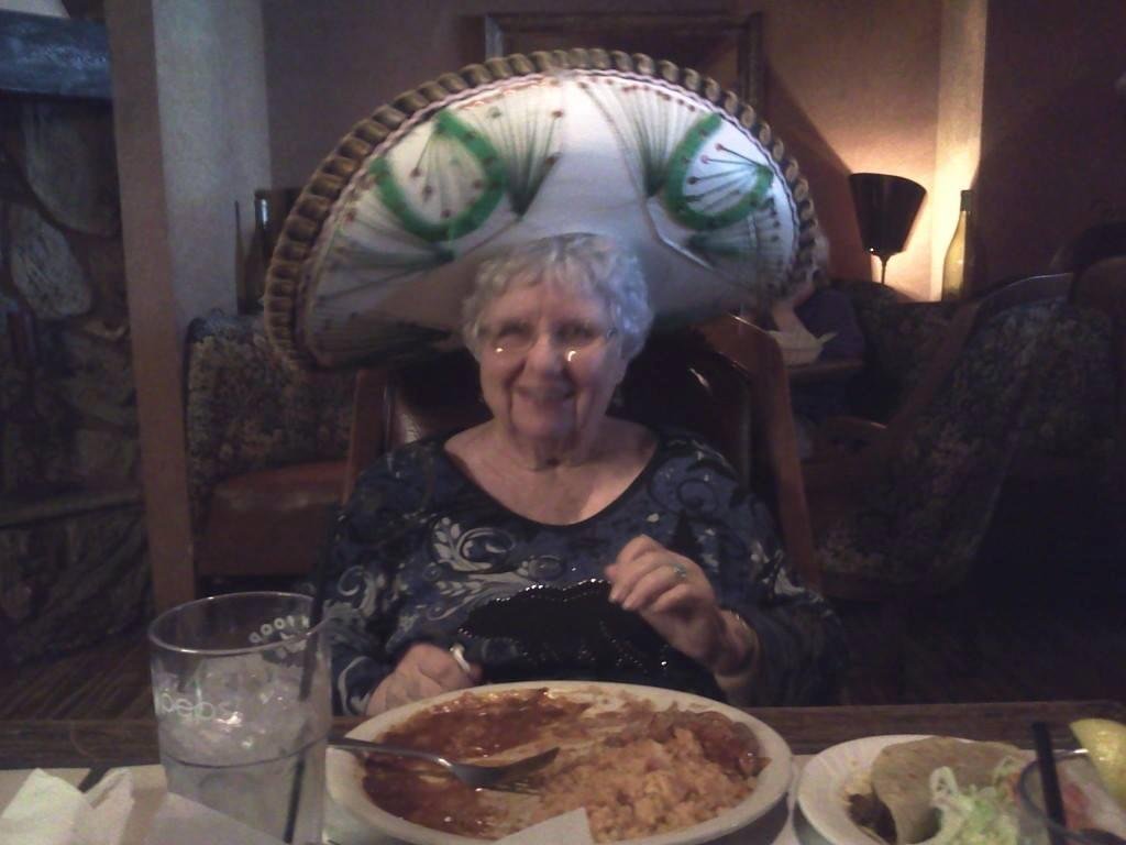 Mom at dinner and her birthday song in the Hat. We had to bring her fried ice cream home we were too full to eat it.