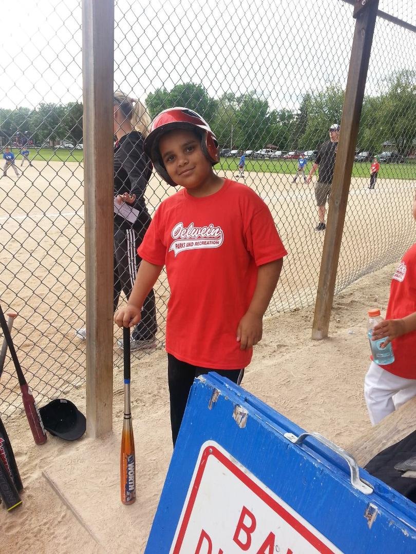 My son learning baseball he looks like a baseball player I love this picture