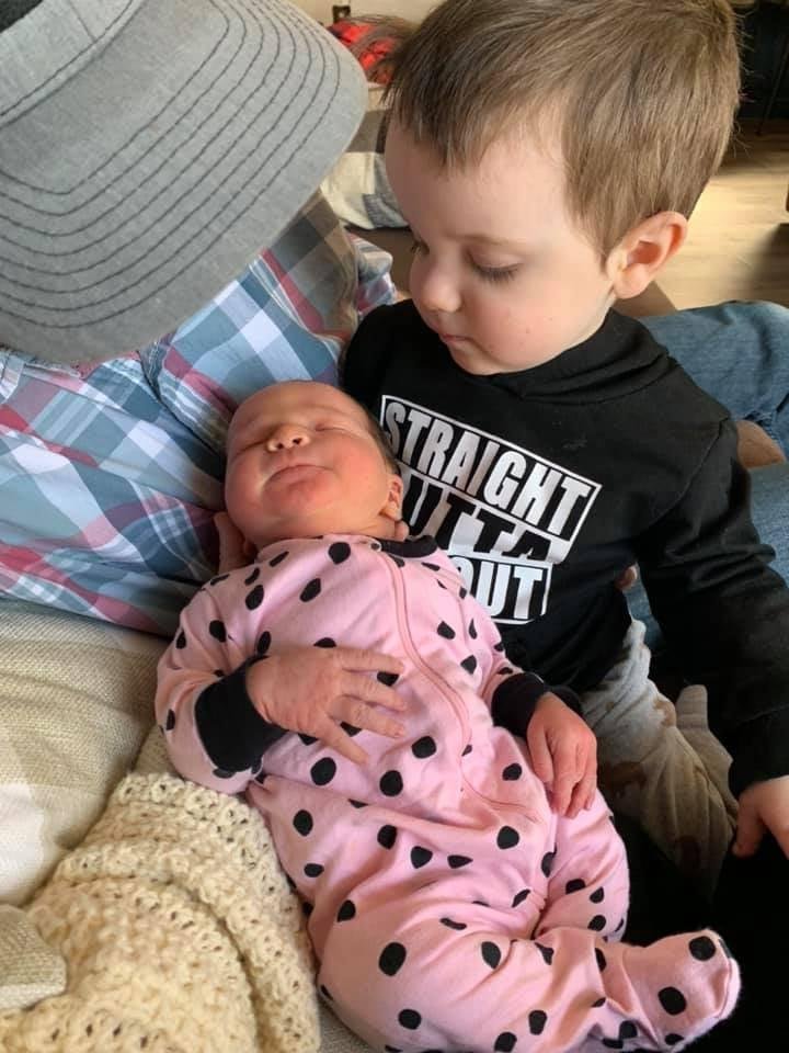2 yr. old brother and new sister.