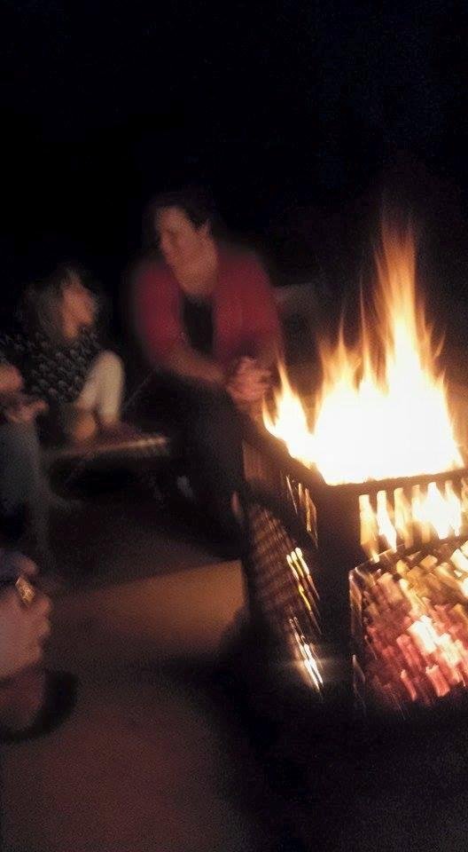 Enjoying a nice warm fire in the backyard with my family.