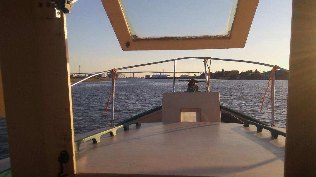 Almost back to Surfside Beach, Texas. We were caught in a storm Sunday morning near Galveston and thought we might not make it back. That salty little boat made it through. The storm shattered the windshield and split
