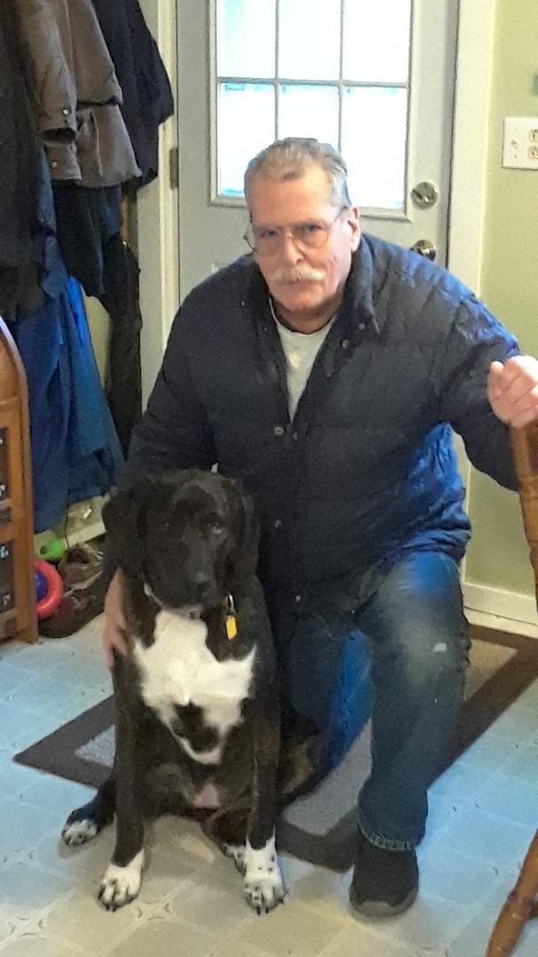 this would be my dog, Timber, one year old, me, getting ready for Medicare, and my down coat, still the warmest piece of clothing despite being over 40 years old...