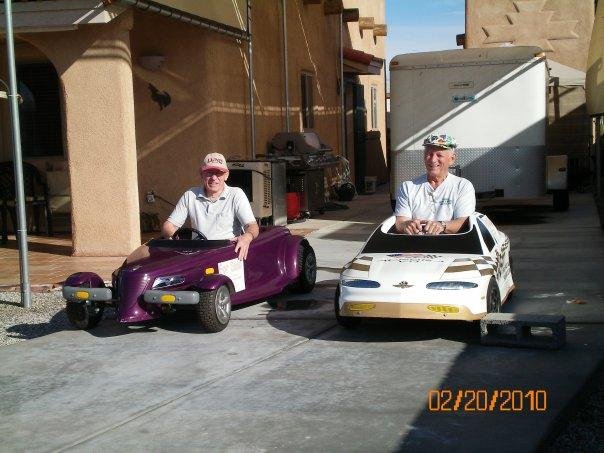 Had a fun day today. Was in the 70's and Ed & Cal Patterson drove Ed's little cars in the Foothills Parade. They got their pictures taken many, many times. The only thing is, one of the cars broke down right at the end o