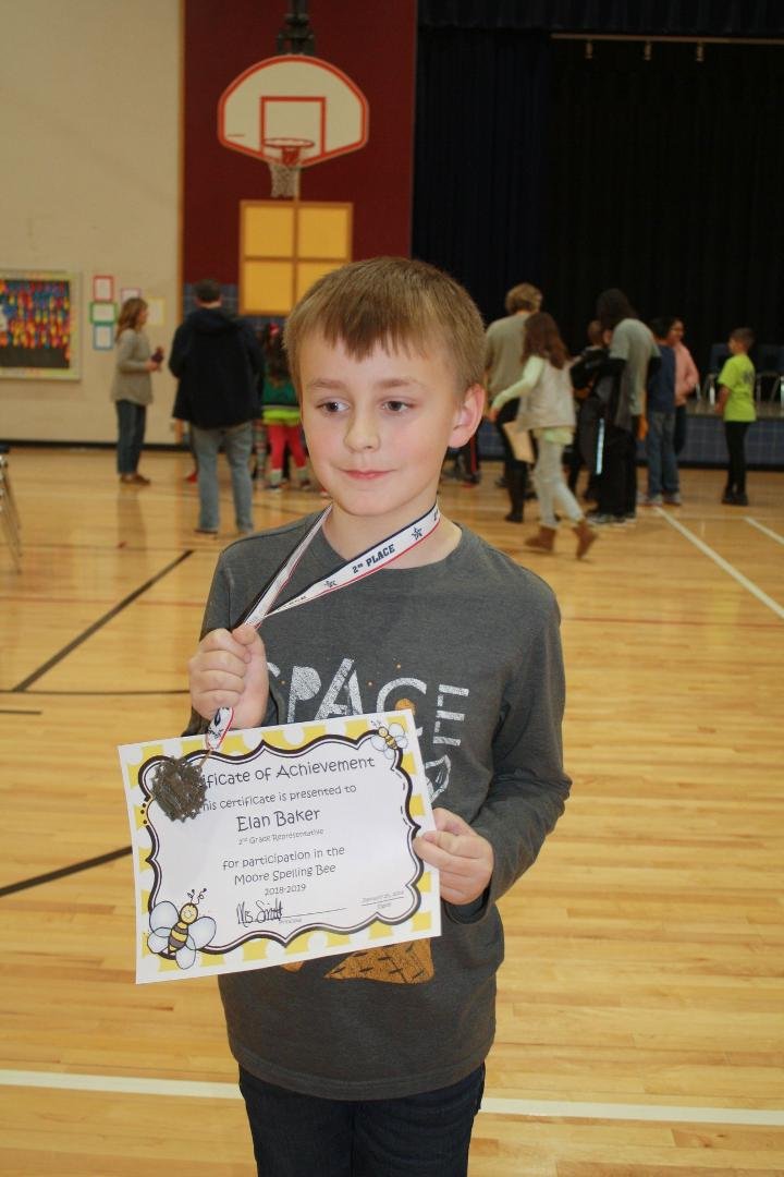 Grandson (second grader) comes in second in his all school spelling bee;