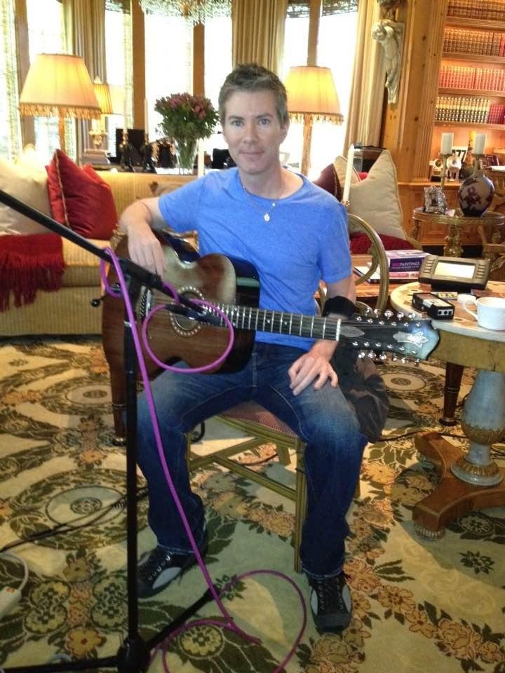 This is the brother of a friend of mine at Rod Stewart's home playing the 12 string that the band used to record the hit " Maggie May" . Is that cool or what ?