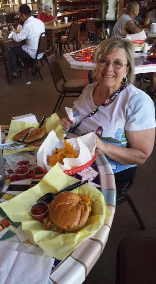 To be certain a regular cheddar cheezy...wieh cheese fries while Peggy has a ladies cut old fashioned hamburger. If you come to San Antonio you have to come here at least once.