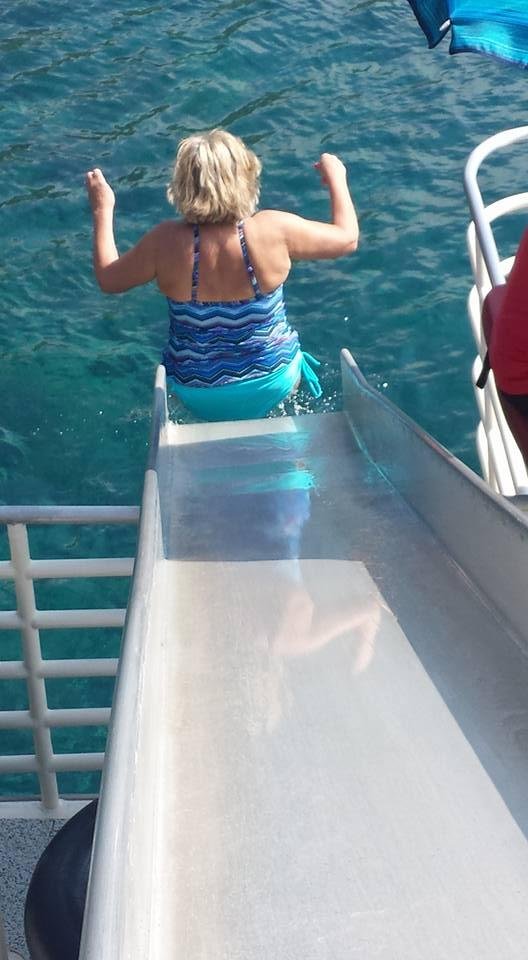 There I go.......down the slide off the boat. Unbelievable scenery. Snorkeling,a great lunch,and being with my wonderful friends. A memory I will always cherish