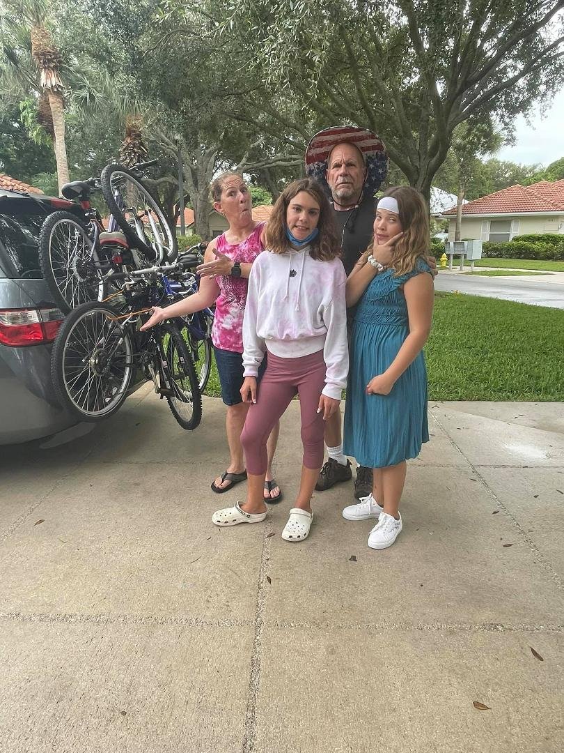 My creative daughter had no problem loading four bikes onto a two-bike carrier for our Florida road trip adventure