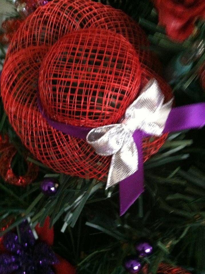 Four of the eight hats on my tree.