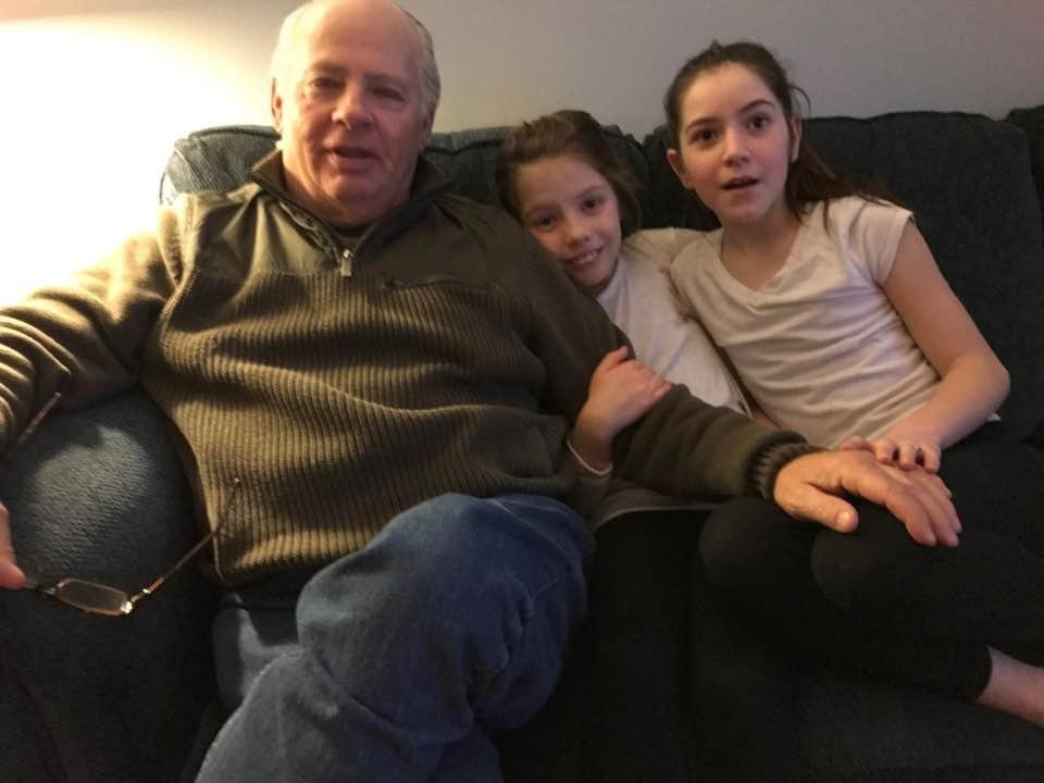 Ava and Sophia have Papa wrapped!