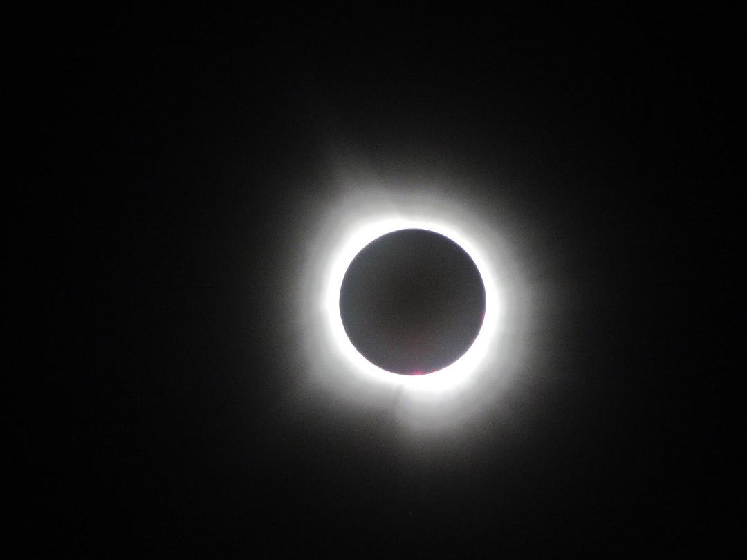 I took this photo yesterday at 1507--right at the maximum of totality.  The photo was taken in Nashville Indiana.