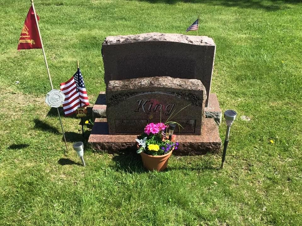 Cleaned up my grandparents stone and added Firefighter marker and flowers