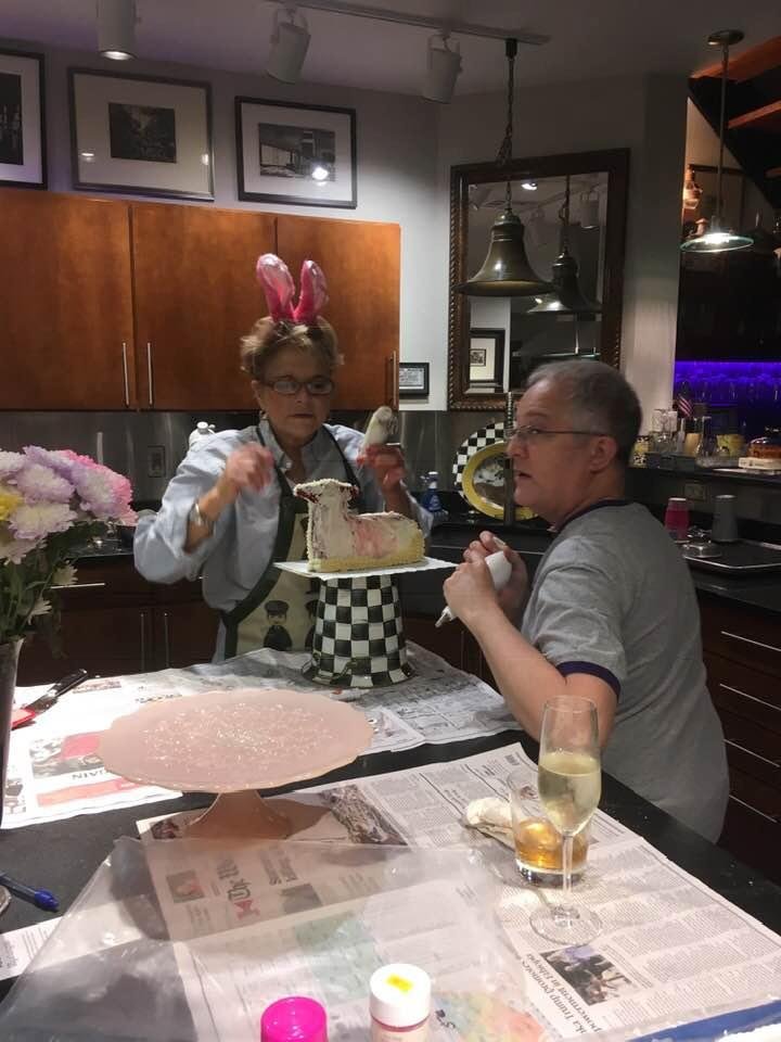 Easter bunny an her assistant making the Caputo Club Lamb Cakes