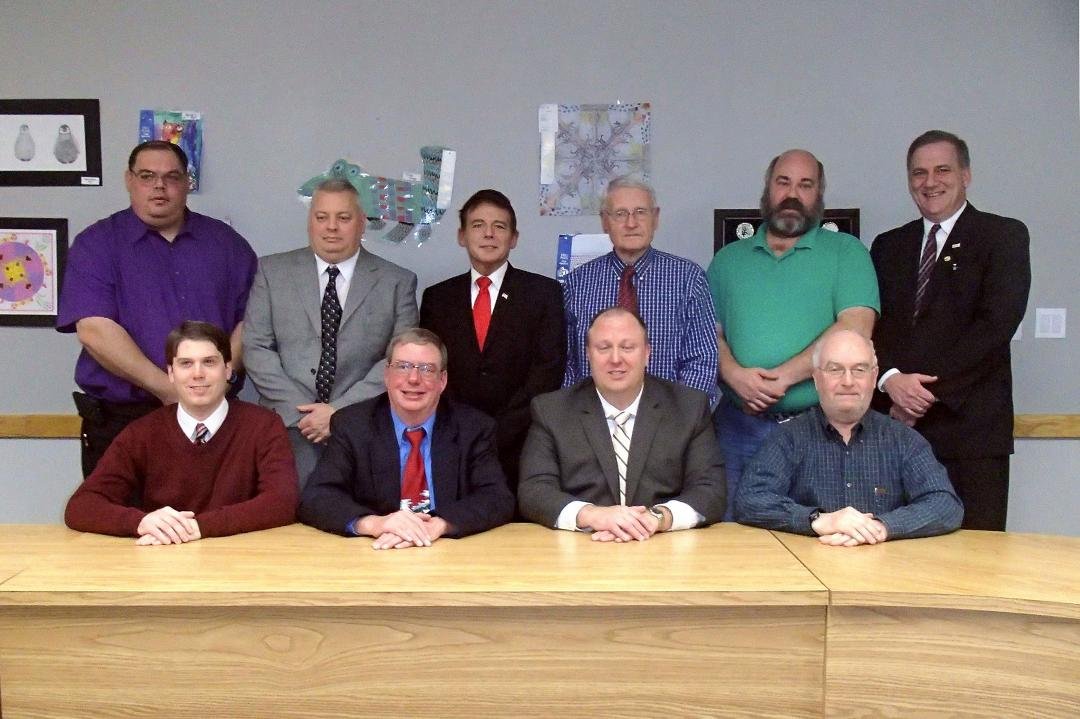The Board of Lackawanna Trail School District 12/7/2015 (l-r) front: Philip Stark, David Thorne, Matthew Rakauskas, Ned Clarke, back: Adrian Bianchi, Karl Beichler, Joe Strauch, Michael Mould, Kevin Mulhern, Joe Ross.