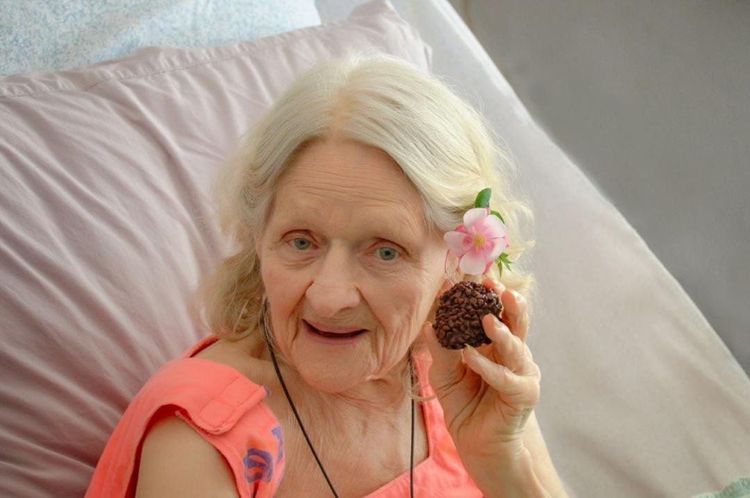Mom on Mother's Day, 2018, with a Shari's Berries.