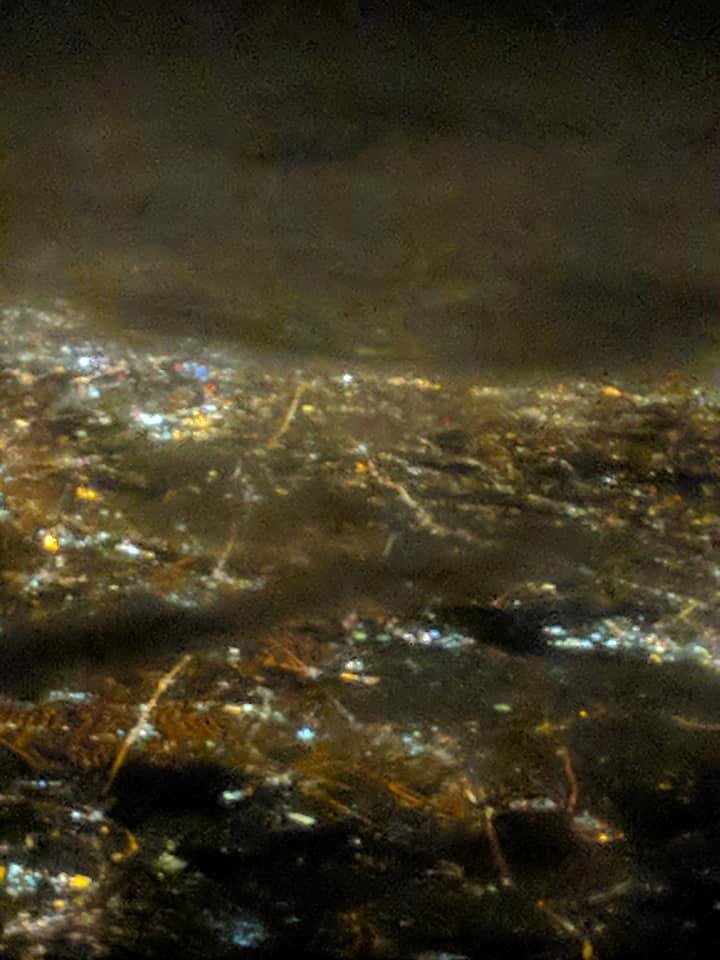 The bright light, top center, is the London Eye (the large ferris wheel).