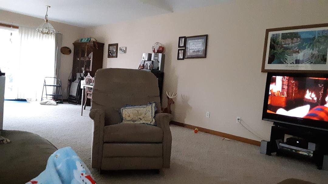 We rearranged the living room. Makes it look bigger.