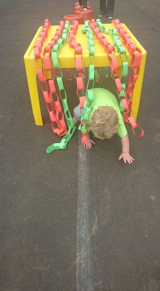 Matthew enjoying the obstacle course at grandparents day.