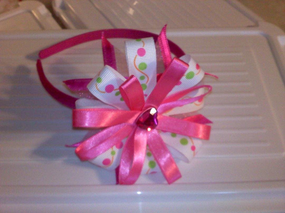 cute pink big bow headband reg price 3.50 and 1.50 for shipping first to comment can get it for 3.00 and 1.00 for shipping